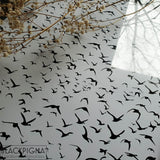 Encadrement de l'affiche minimaliste Vol d'oiseaux, avec ses beaux reflets.