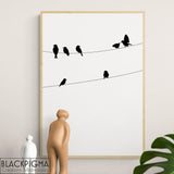 Mockup affiche minimaliste en noir et blanc de petits oiseaux sur un fil.